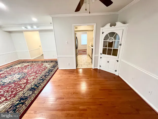 a kitchen with stainless steel appliances a refrigerator and a sink