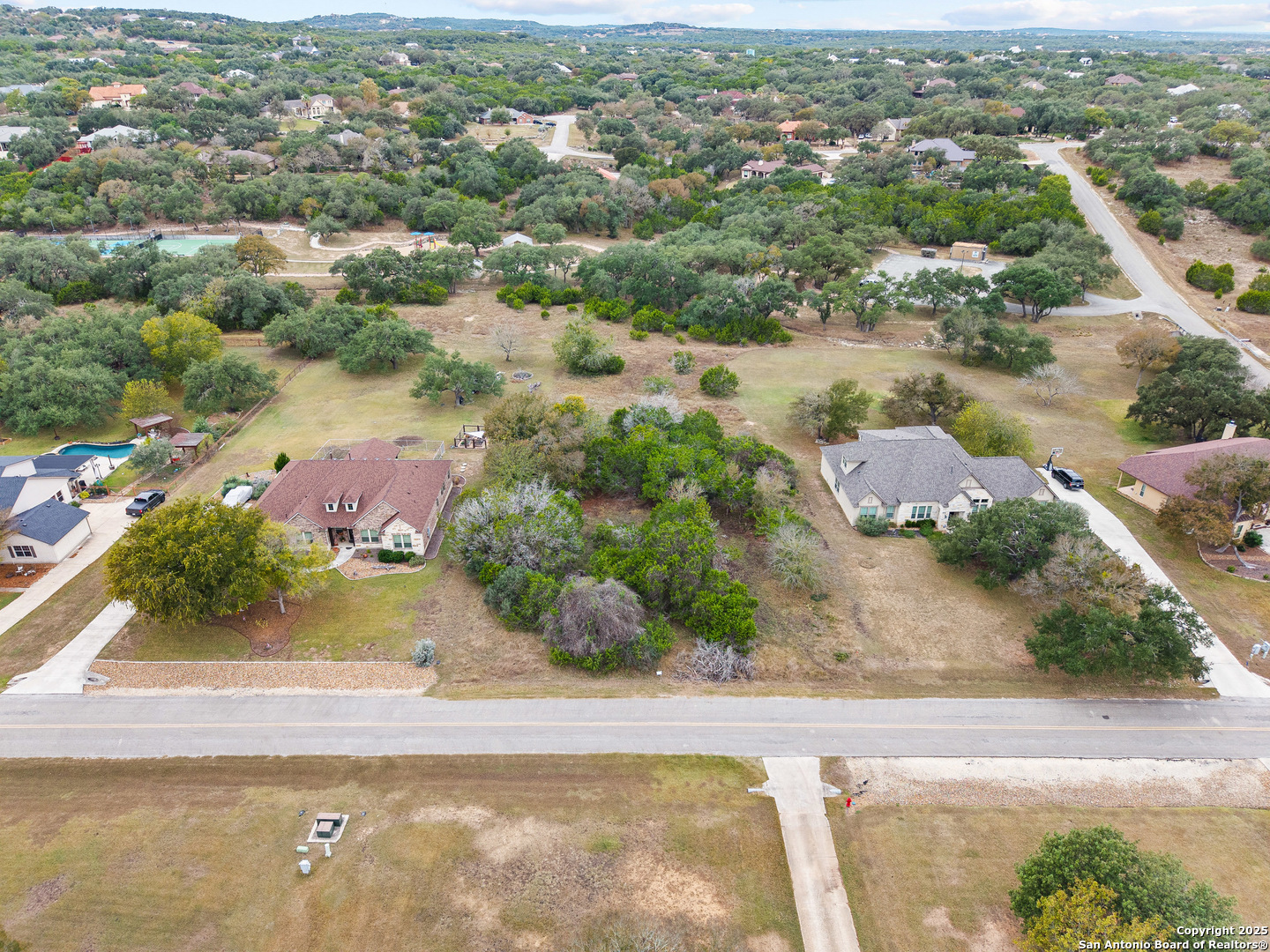 737 Long Meadow Spring Branch, TX 78070 - Photo 1 of 20 an aerial view of residential houses with outdoor space