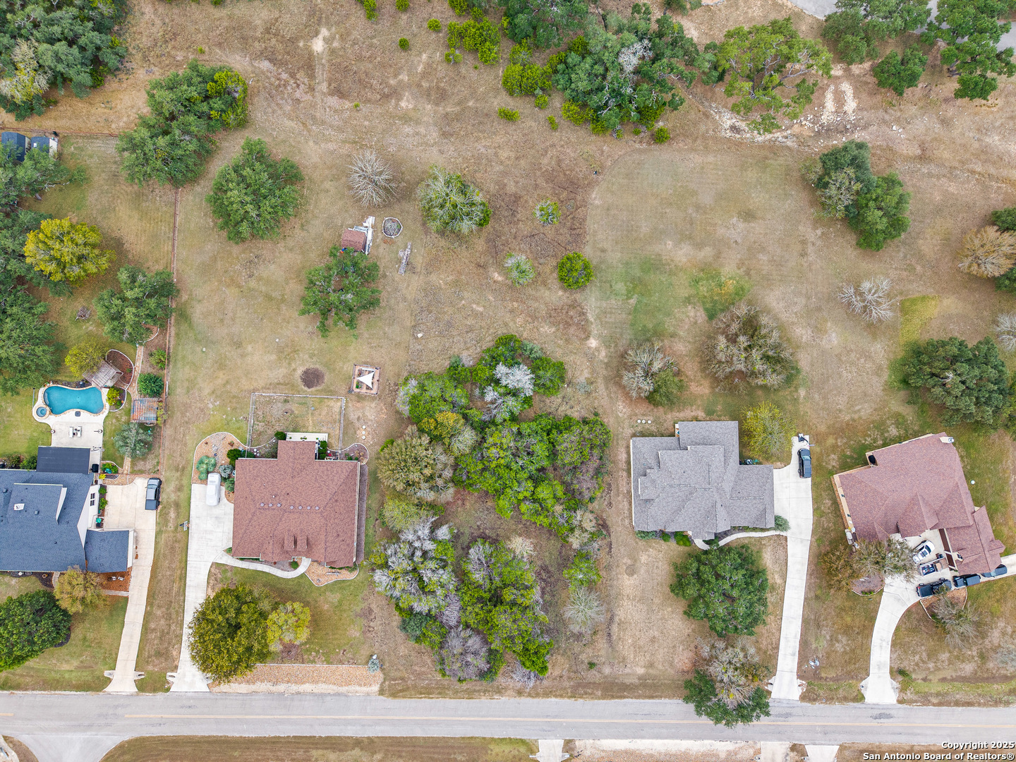 737 Long Meadow Spring Branch, TX 78070 - Photo 3 of 20 an aerial view of a house with yard and seating space