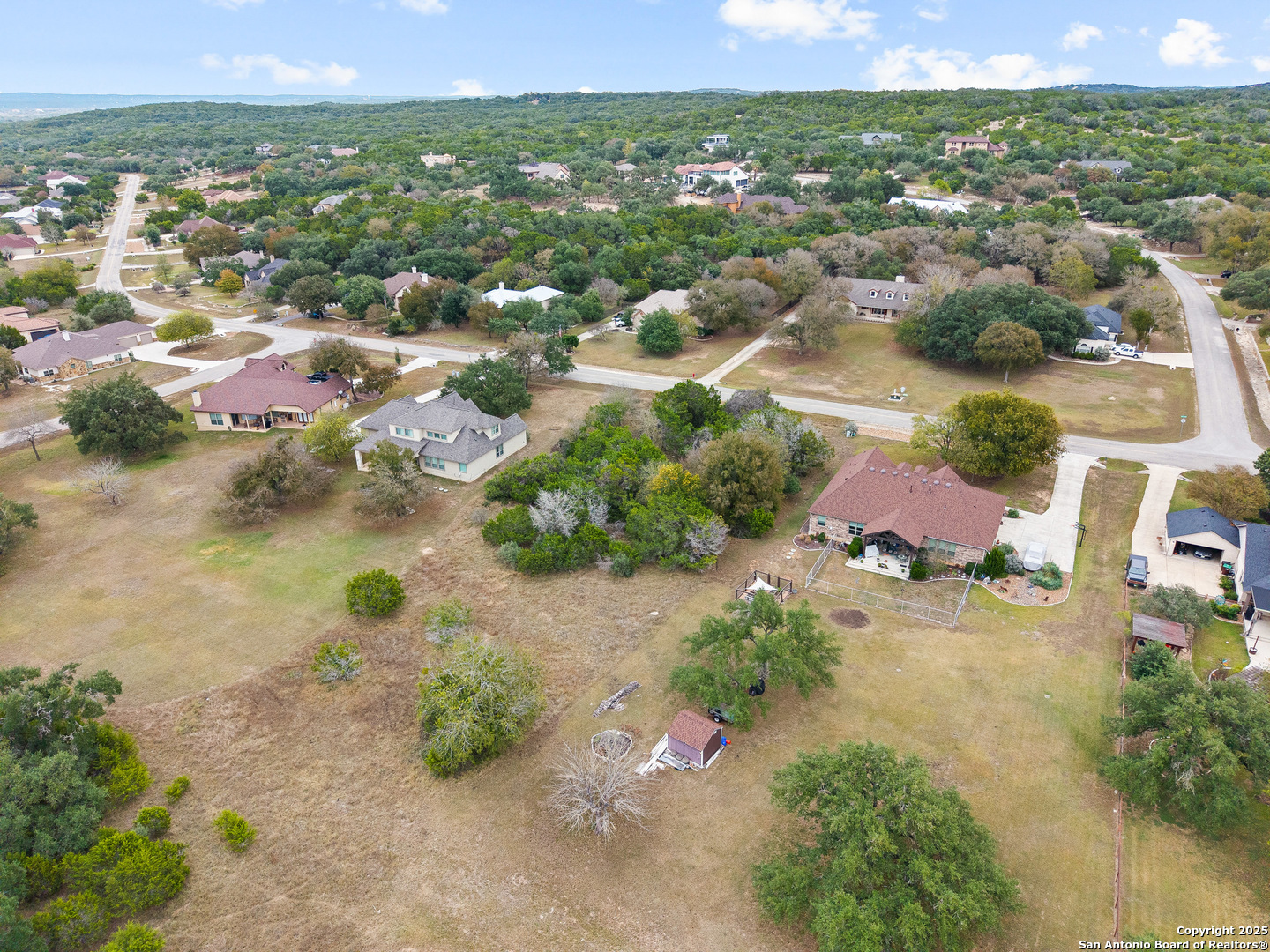 737 Long Meadow Spring Branch, TX 78070 - Photo 6 of 20 an aerial view of residential houses with outdoor space and trees