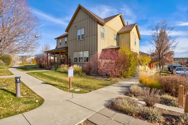 a view of a street with houses