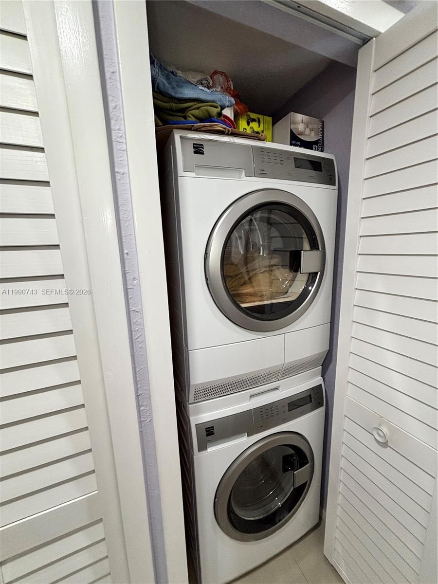 2310 West 74th Street, Unit 103 Hialeah, FL 33016 - Photo 11 of 18 a utility room with dryer and washer