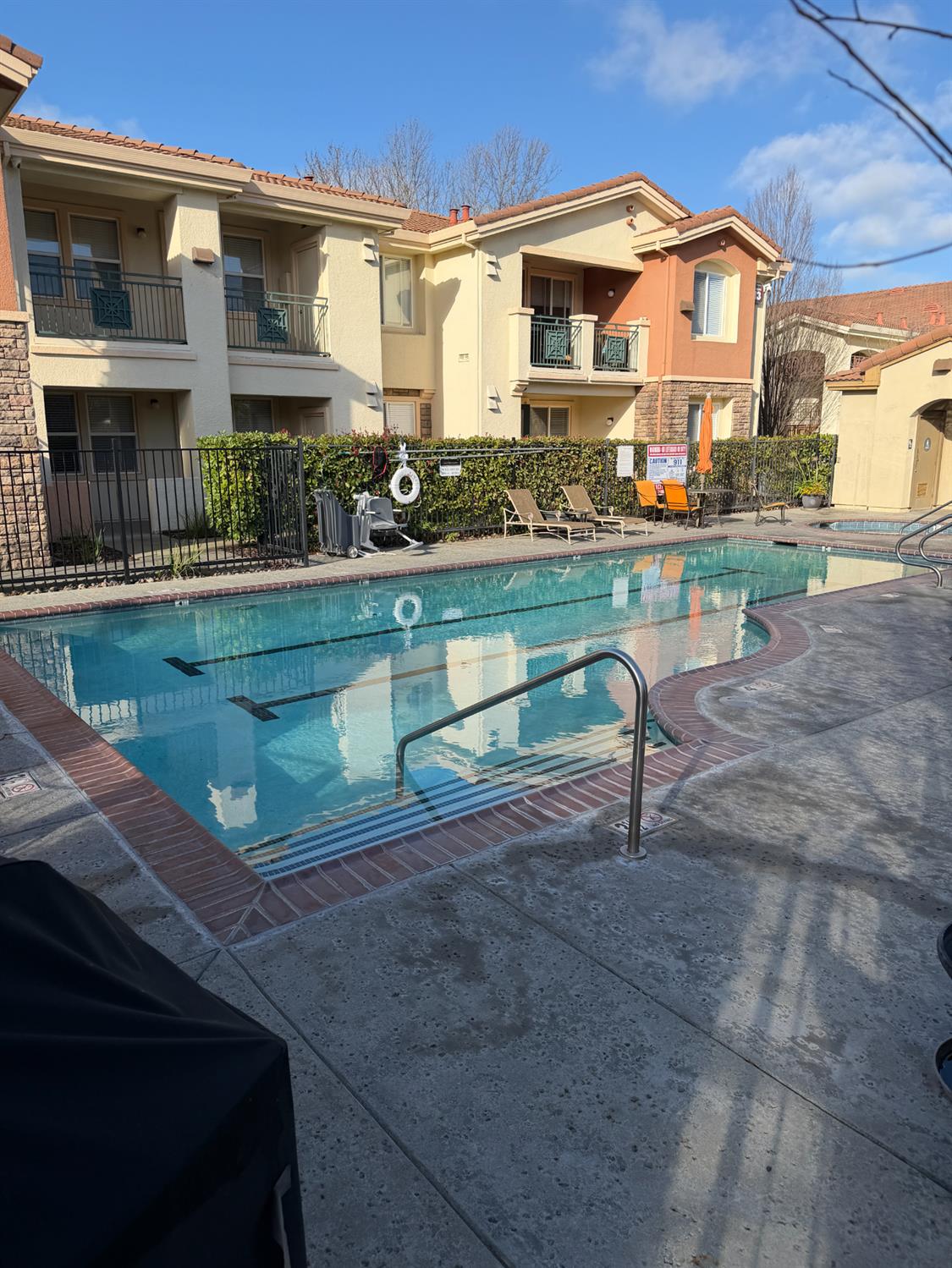 1501 Secret Ravine Parkway, Unit 1916 Roseville, CA 95661 - Photo 32 of 41 a front view of a house with swimming pool