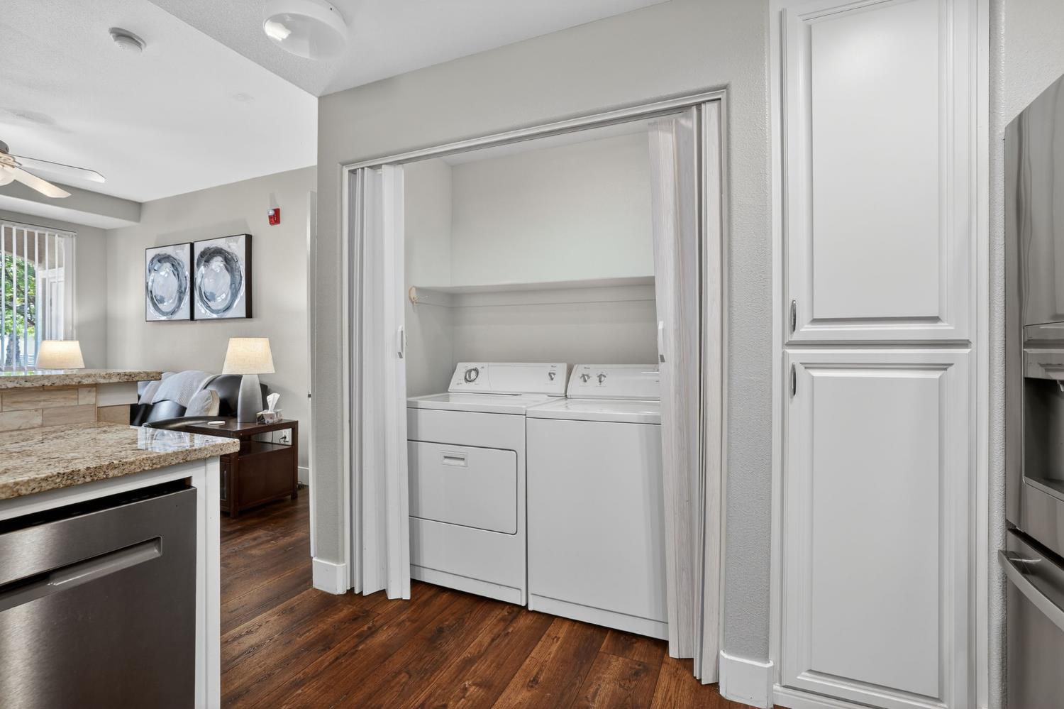 1501 Secret Ravine Parkway, Unit 1916 Roseville, CA 95661 - Photo 7 of 41 a view of a storage & utility room with closet wooden floor