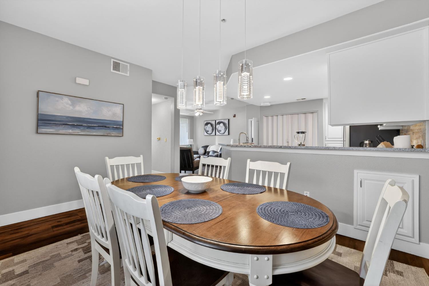 1501 Secret Ravine Parkway, Unit 1916 Roseville, CA 95661 - Photo 10 of 41 a view of a dining room with furniture and wooden floor