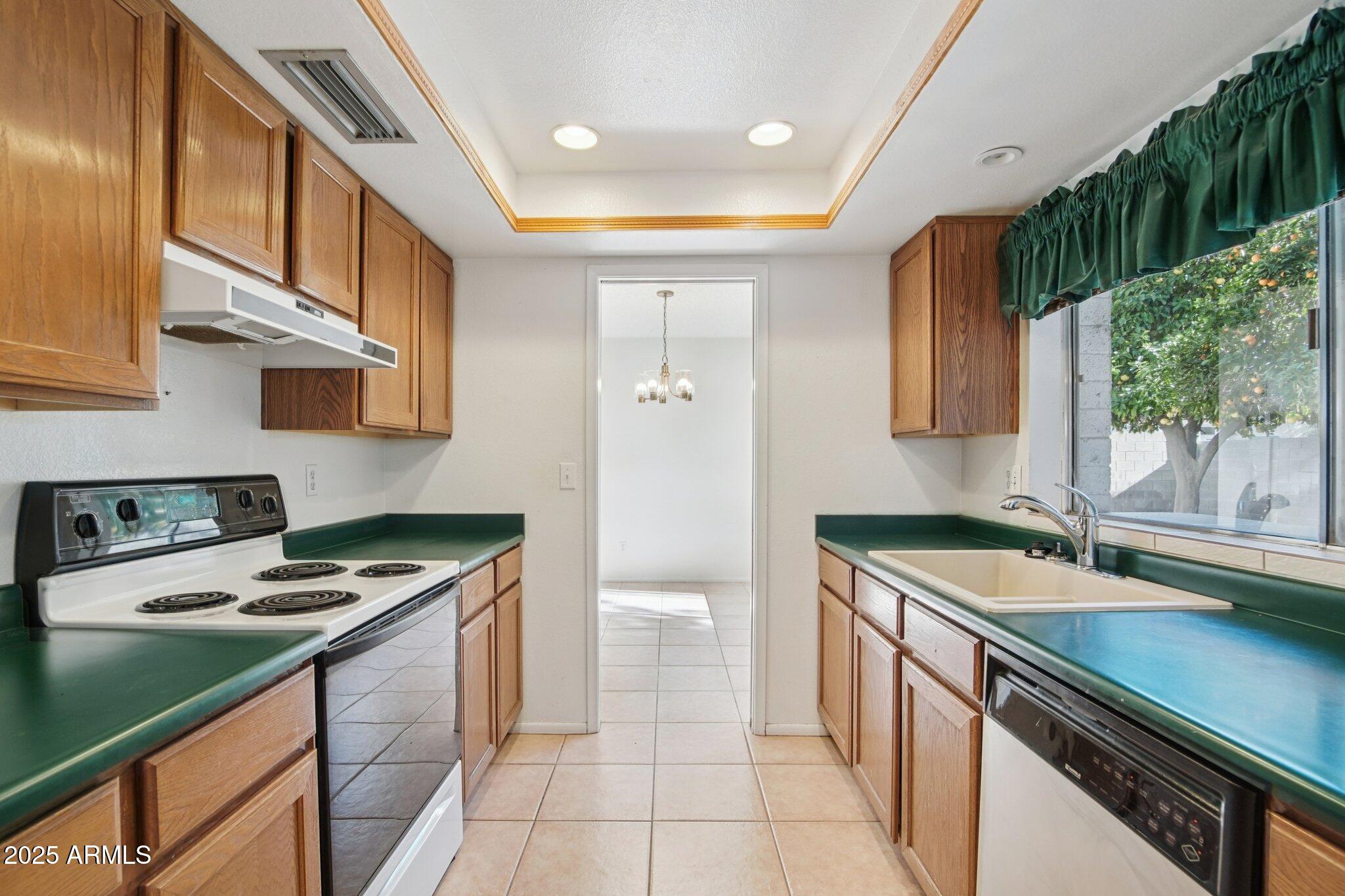 4323 West Bloomfield Road Glendale, AZ 85304 - Photo 13 of 26 Kitchen to Dining Room