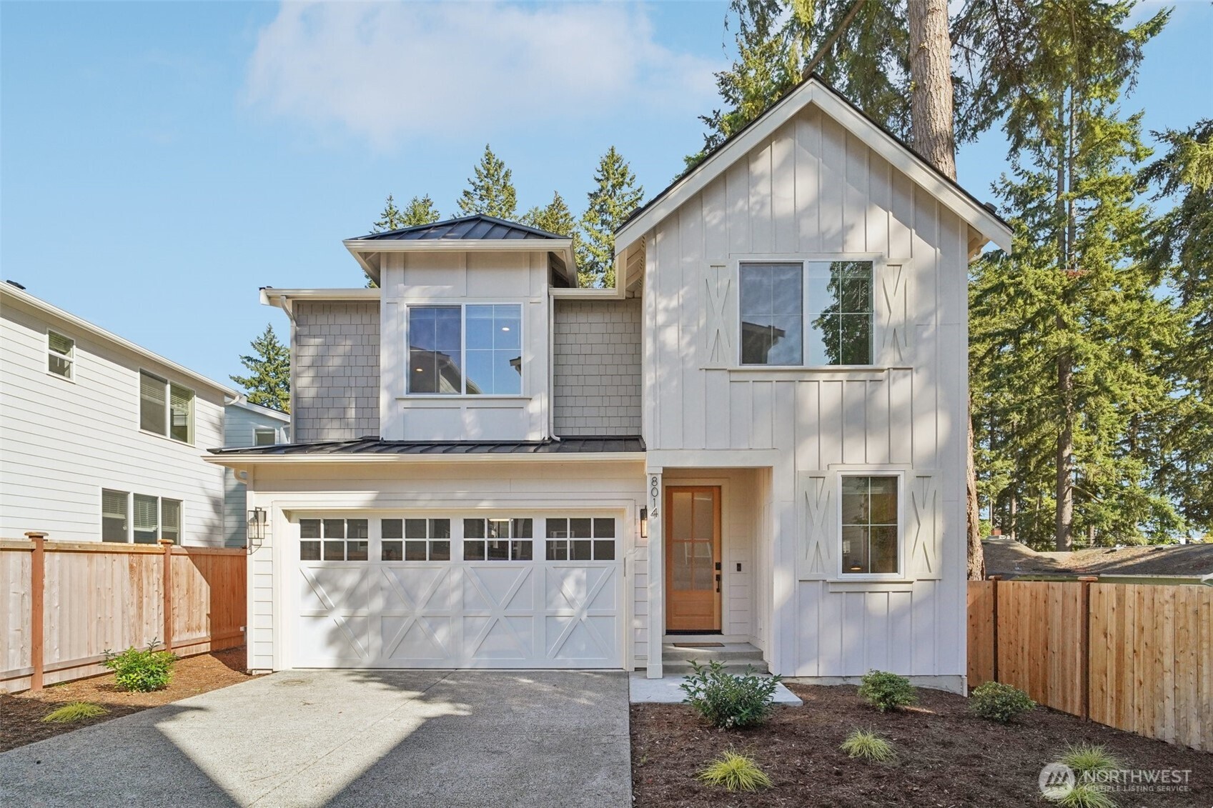 8014 222nd Street Southwest Edmonds, WA 98026 - Photo 1 of 29 a front view of a house with a yard