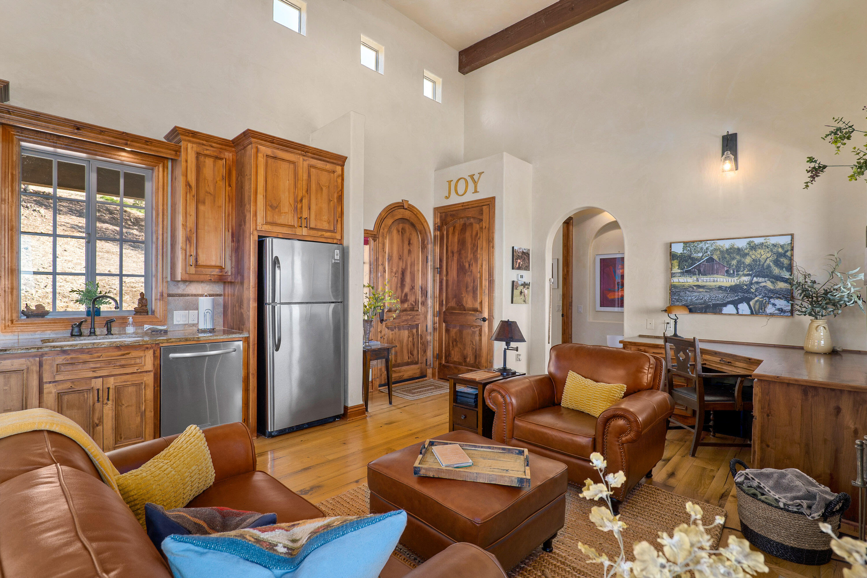 766 Meridian Road Eagle Point, OR 97524 - Photo 53 of 66 a living room with furniture a fireplace and kitchen view
