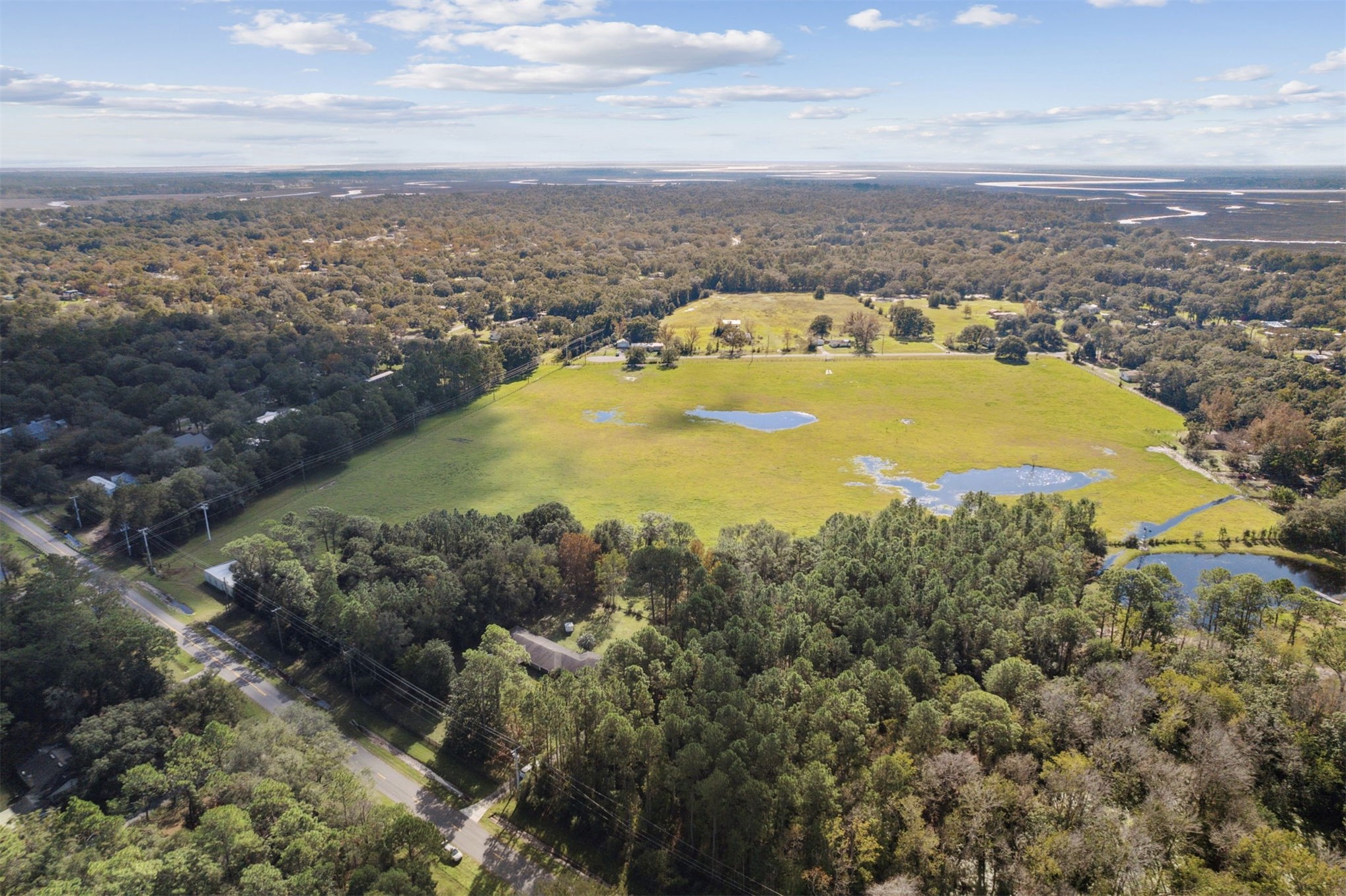 25-30 Radio Avenue Yulee, FL 32097 - Photo 11 of 21 an aerial view of residential houses with outdoor space