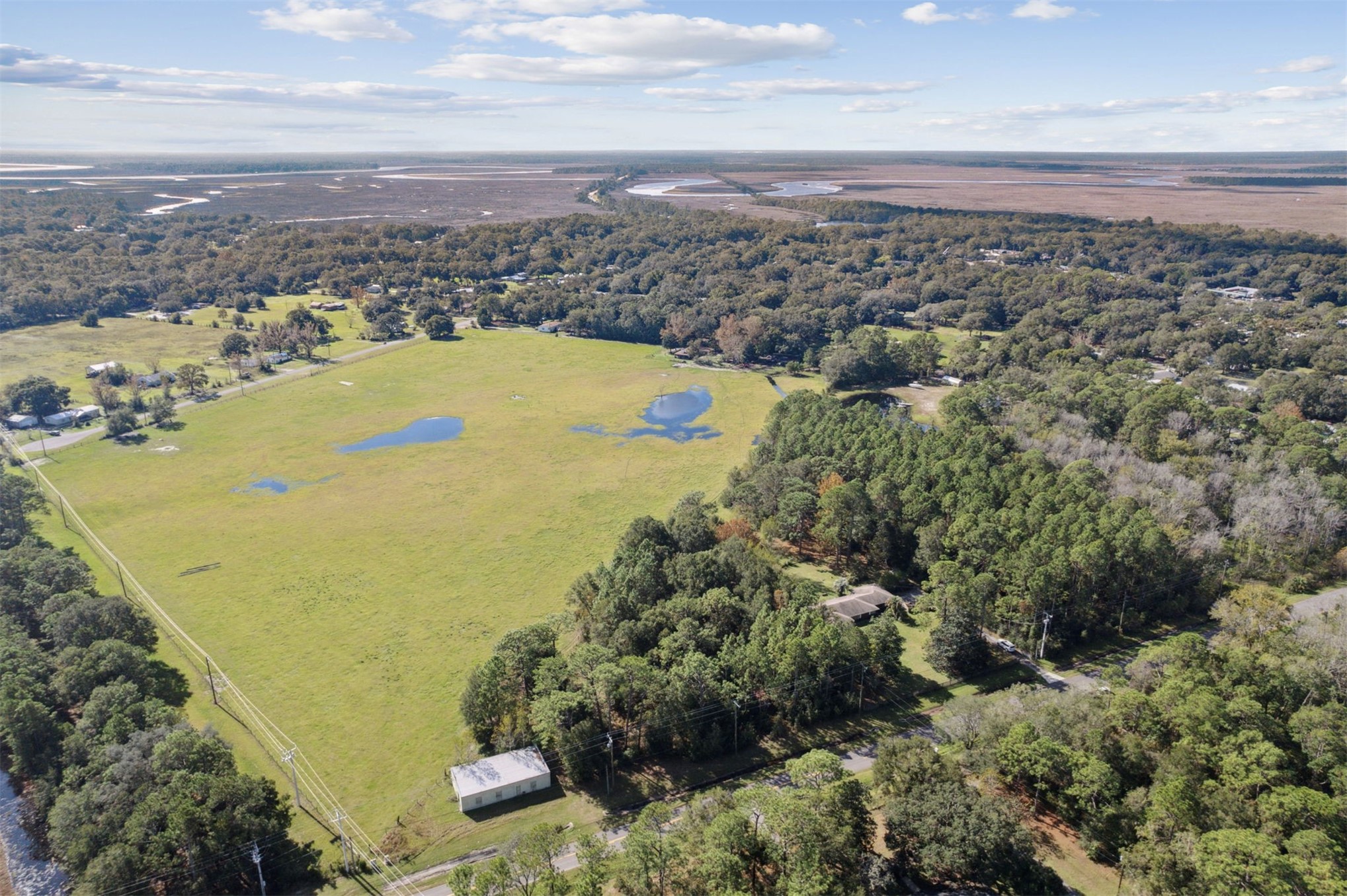 25-30 Radio Avenue Yulee, FL 32097 - Photo 13 of 21 an aerial view of residential houses with outdoor space