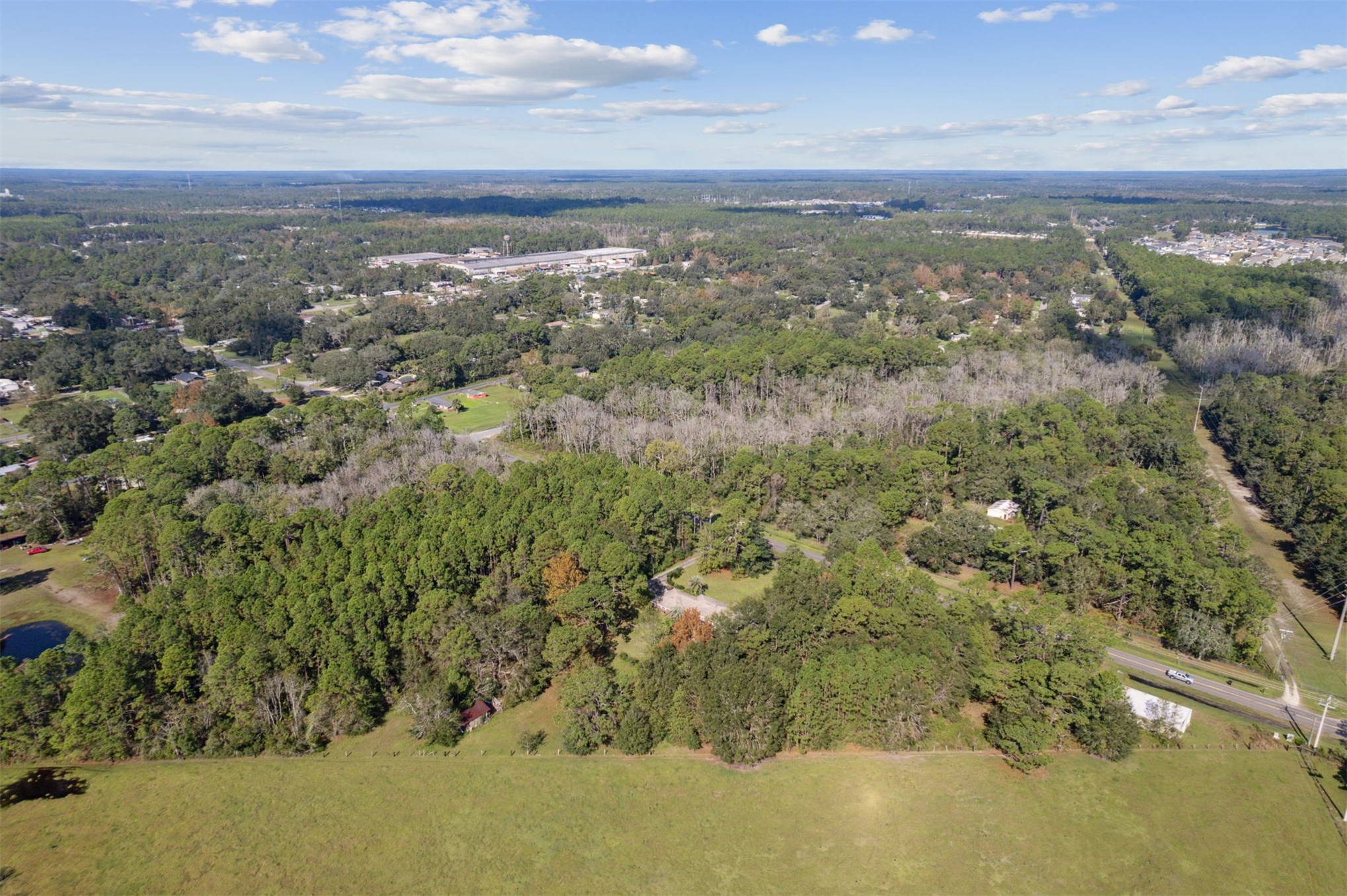 25-30 Radio Avenue Yulee, FL 32097 - Photo 15 of 21 a view of a city with mountains in the background