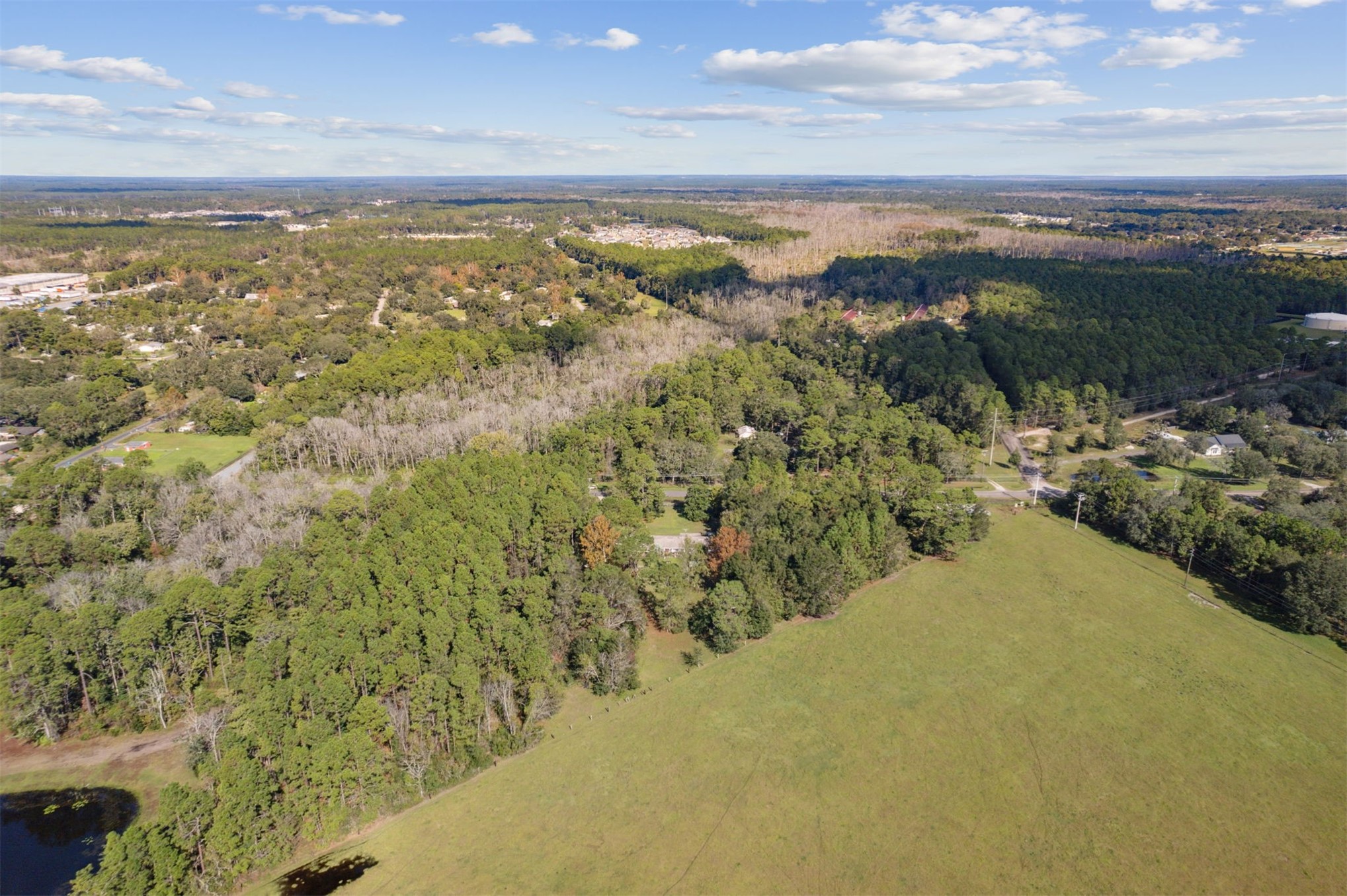 25-30 Radio Avenue Yulee, FL 32097 - Photo 16 of 21 a view of a city with mountains in the background
