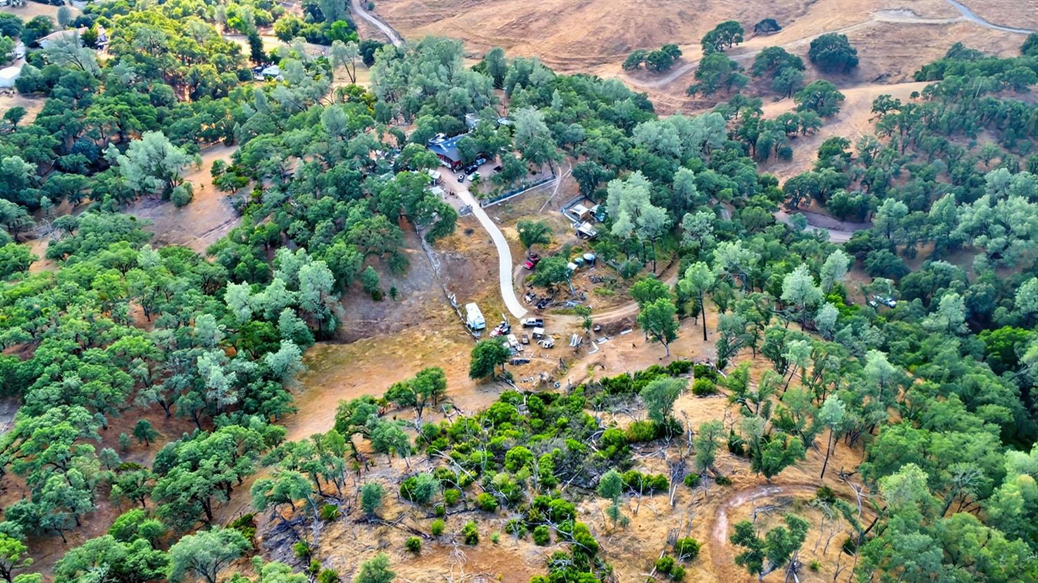 5263 Chile Camp Road Campo Seco X, CA 95226 - Photo 23 of 24 an aerial view of residential houses with outdoor space and trees