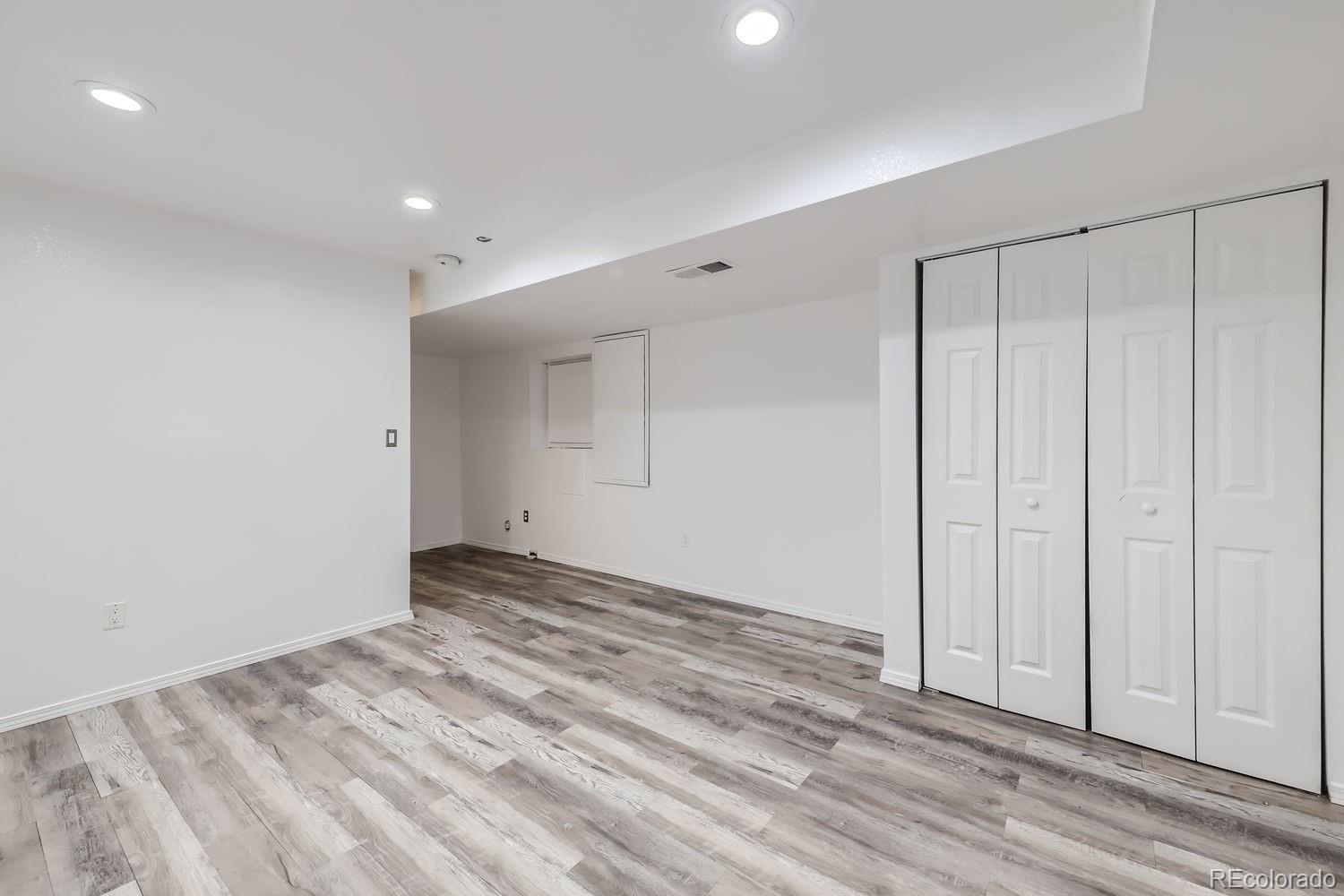 4512 Cornish Way Denver, CO 80239 - Photo 25 of 35 a view of an empty room