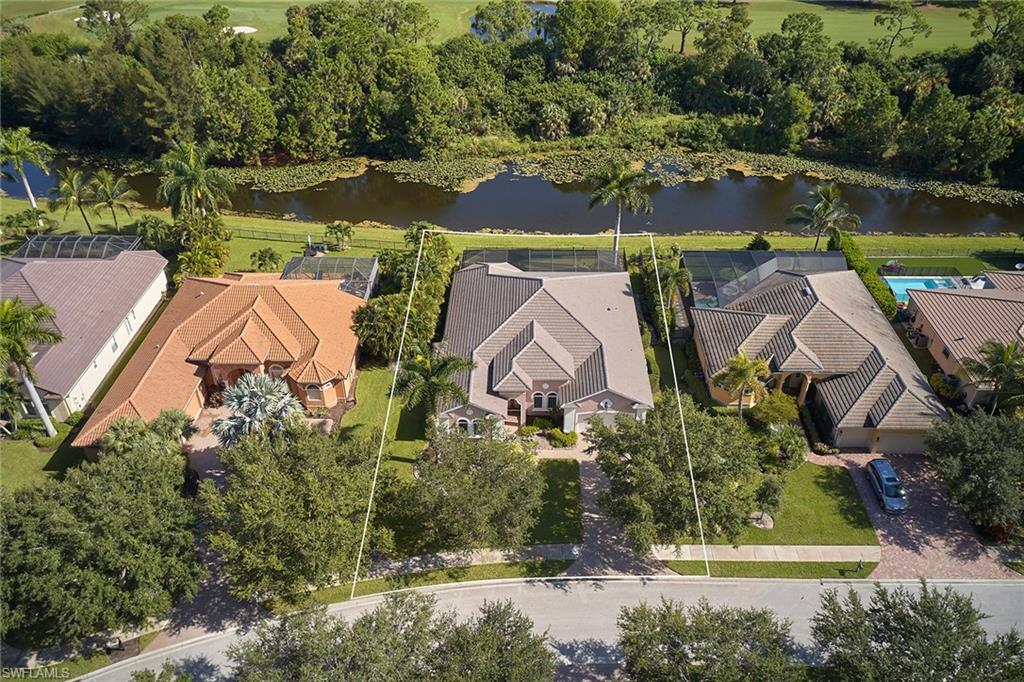 419 Saddlebrook Lane Naples, FL 34110 - Photo 24 of 24 an aerial view of house with yard swimming pool and outdoor seating