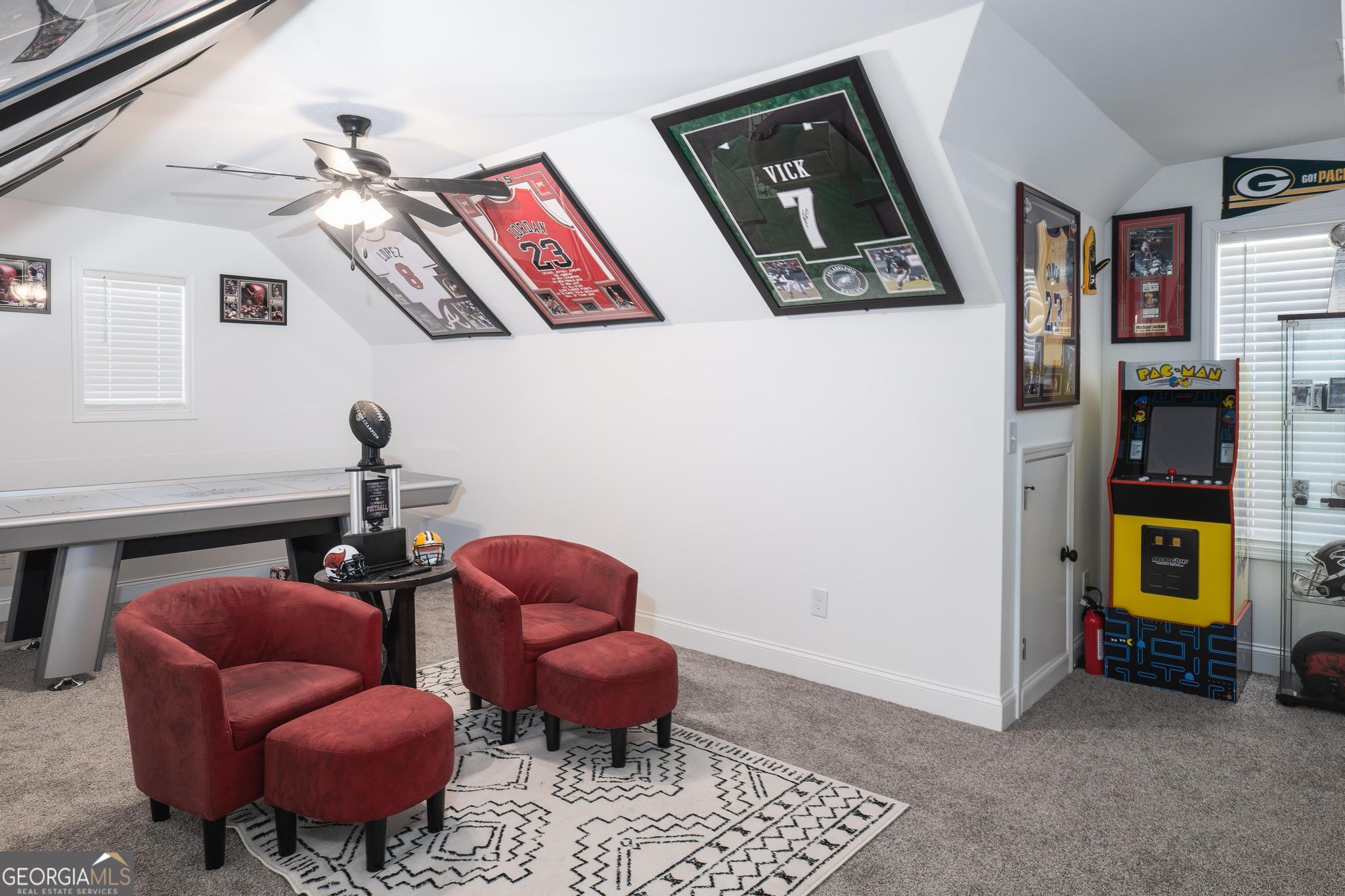 1016 Farmington Road Griffin, GA 30224 - Photo 20 of 31 a living room with furniture and painting on the wall