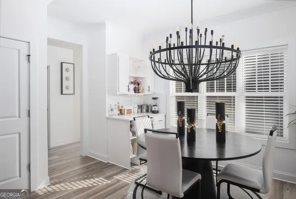 a view of a dining room with furniture