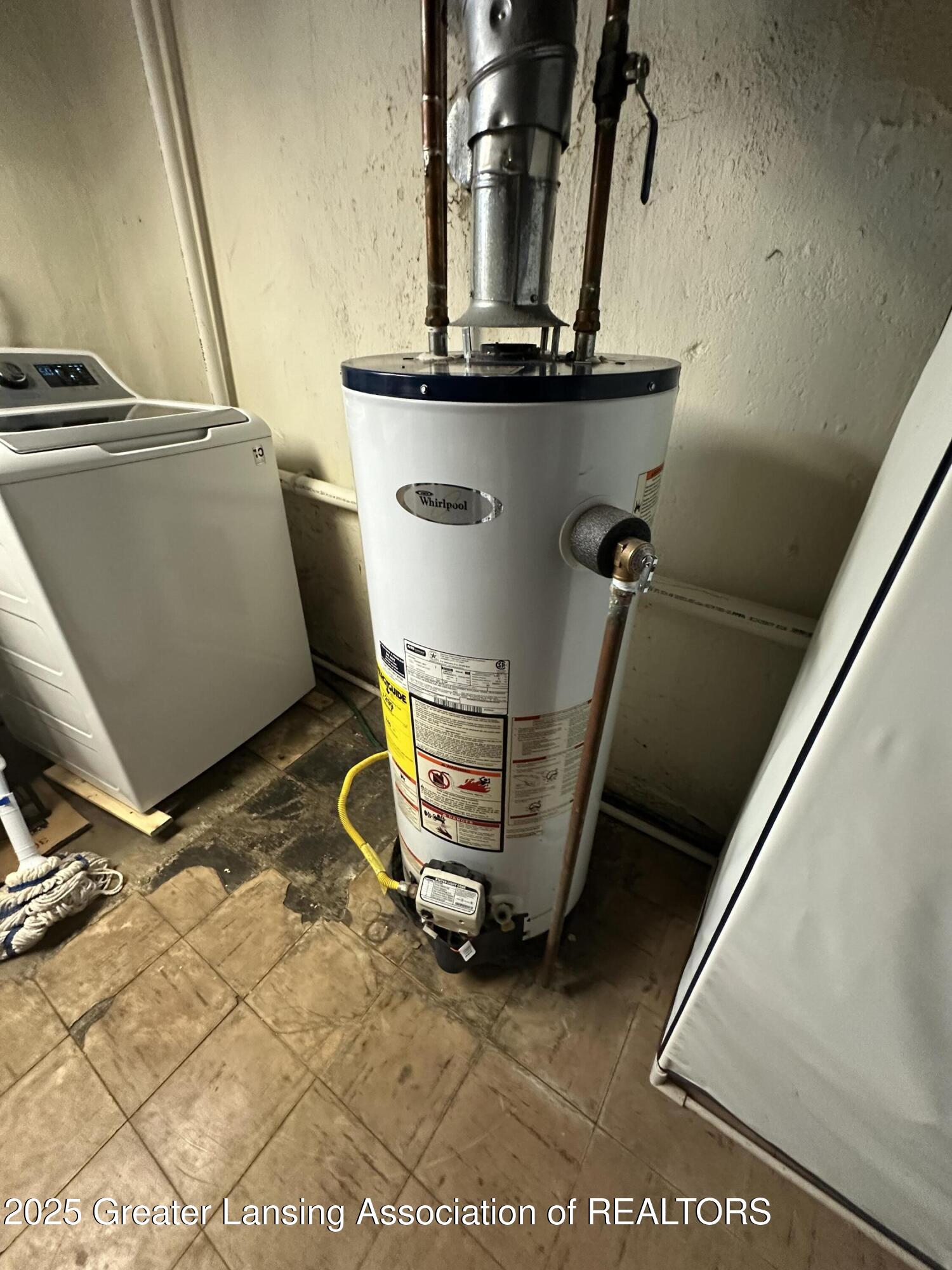 2107 Westbury Road Lansing, MI 48906 - Photo 31 of 31 water heater
