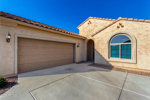 a view of a house with a garage