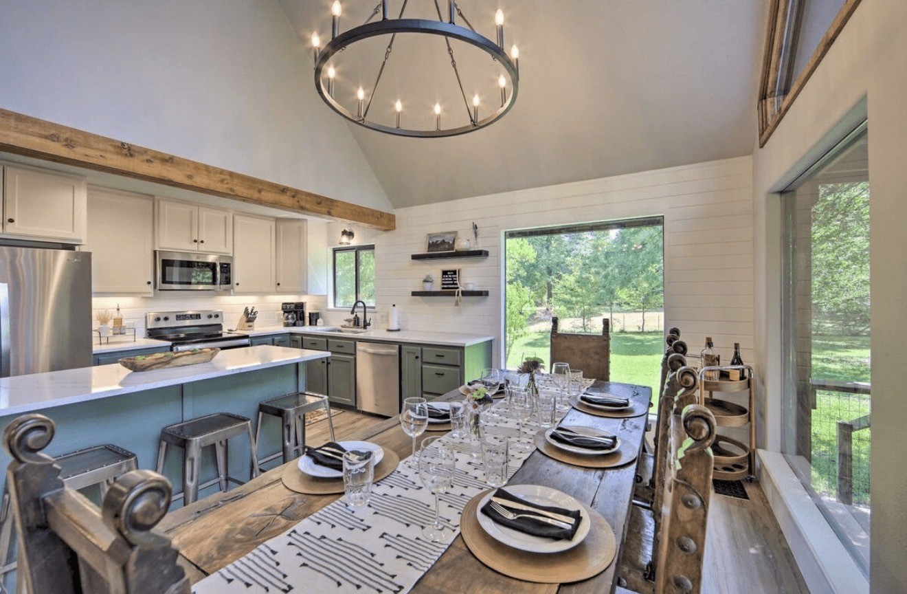 10630 River Ranch Road Kemp, TX 75143 - Photo 7 of 36 a kitchen with stainless steel appliances a table and chairs in it
