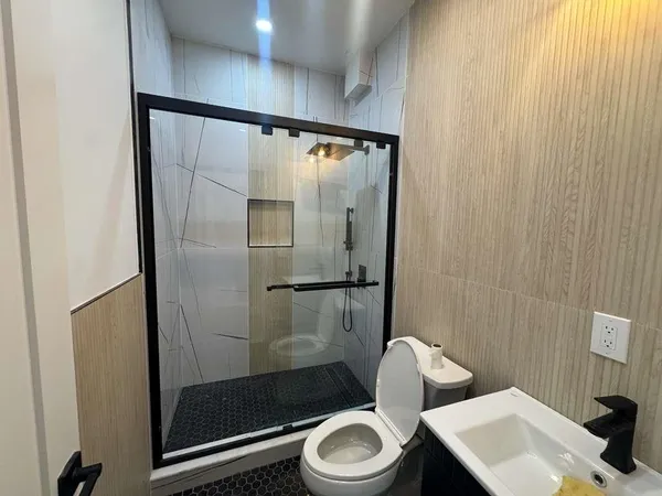 a bathroom with a sink and a toilet