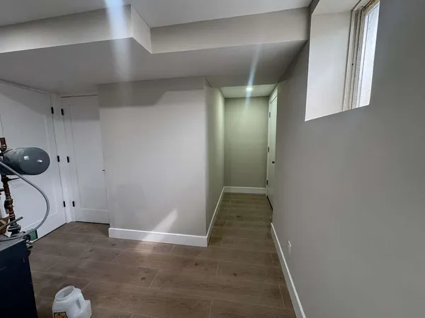 a view of a livingroom with wooden floor