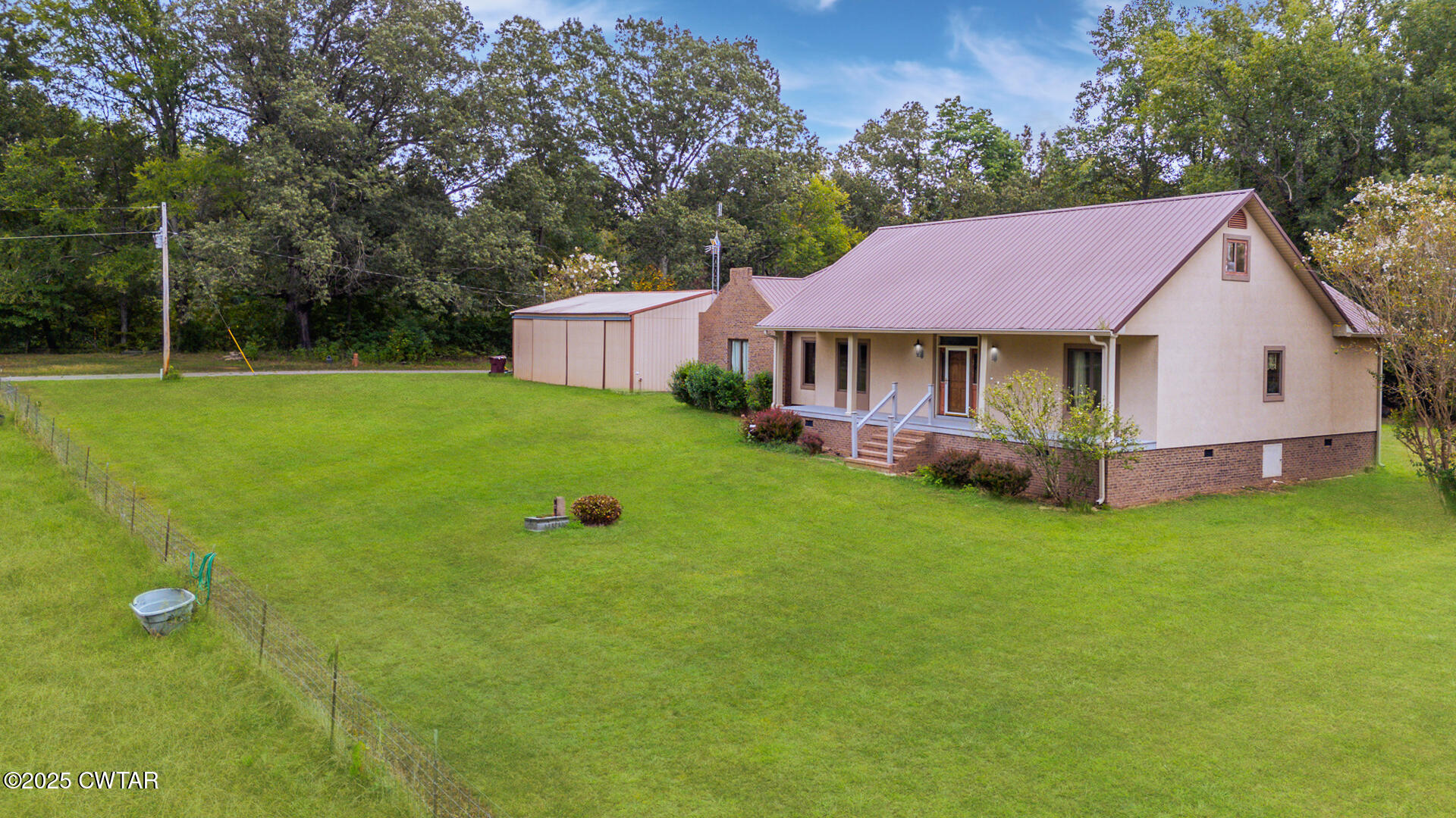 3554 Shades Bridge Road Greenfield, TN 38230 - Photo 48 of 49 a view of a house with a backyard