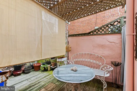 a bedroom with a bed and dresser