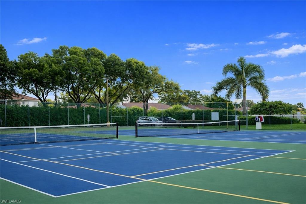 387 Melrose Place Naples, FL 34104 - Photo 25 of 26 a view of a tennis court