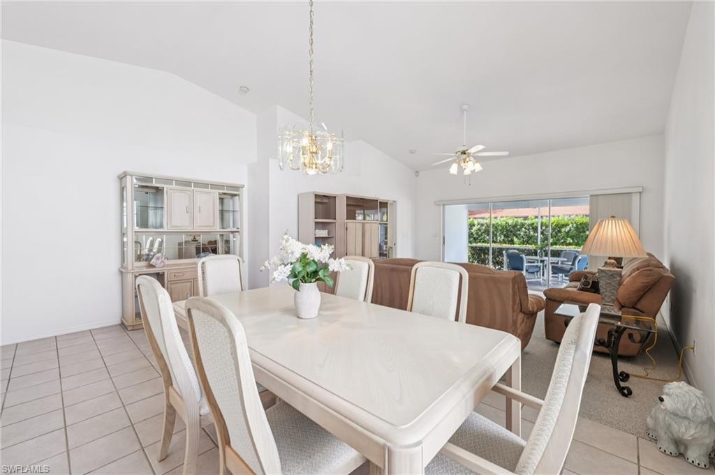 387 Melrose Place Naples, FL 34104 - Photo 3 of 26 a view of a dining room with furniture window and outside view