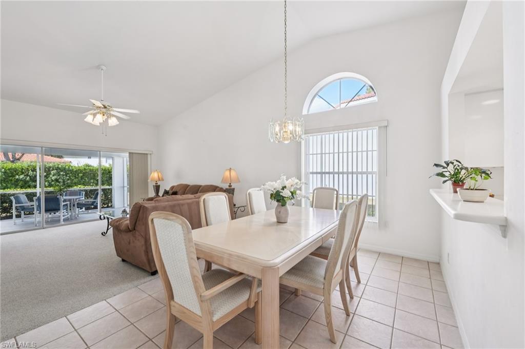 387 Melrose Place Naples, FL 34104 - Photo 4 of 26 a view of a dining room with furniture window and outside view