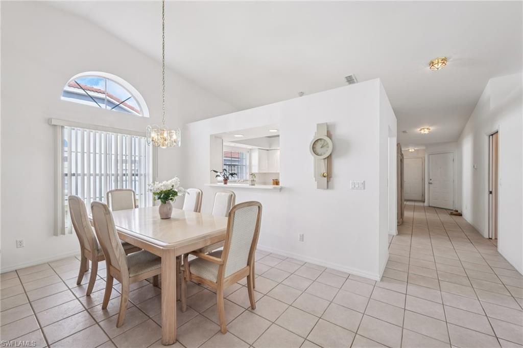 387 Melrose Place Naples, FL 34104 - Photo 5 of 26 a view of a dining room with furniture