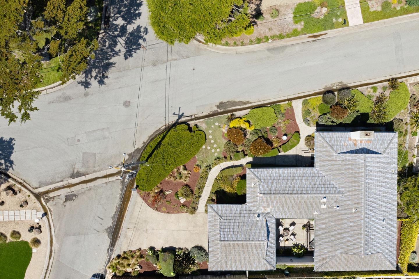1244 Surf Avenue Pacific Grove, CA 93950 - Photo 32 of 43 an aerial view of a house with a swimming pool