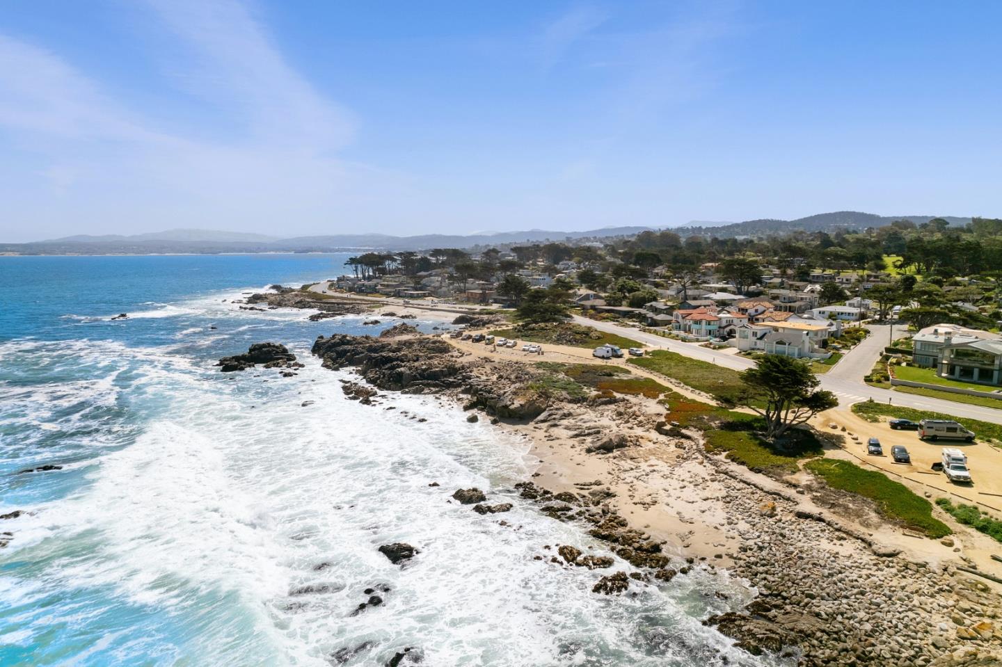 1244 Surf Avenue Pacific Grove, CA 93950 - Photo 38 of 43 a view of a beach with a ocean view
