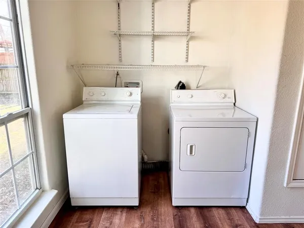a utility room with dryer and washer
