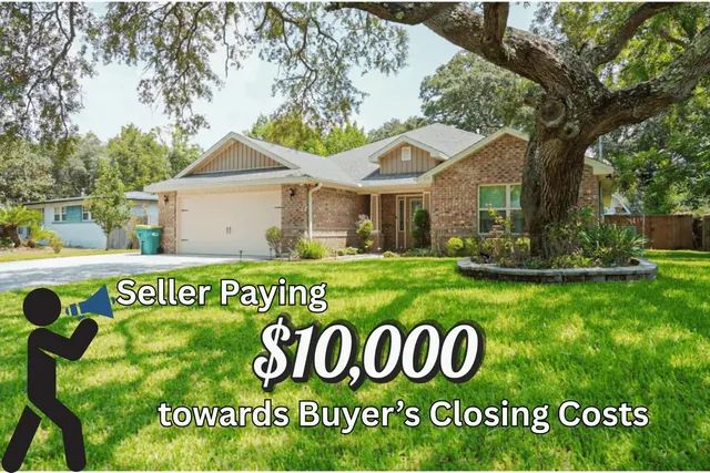 a view of front of house with a sign board