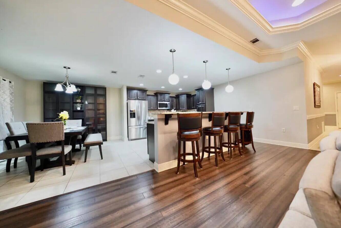 109 Thornhill Road Fort Walton Beach, FL 32547 - Photo 14 of 38 a view of a dining room with furniture and wooden floor