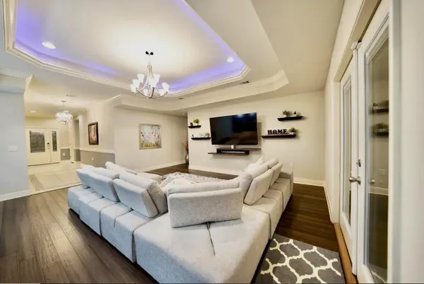 a view of a livingroom with furniture and window