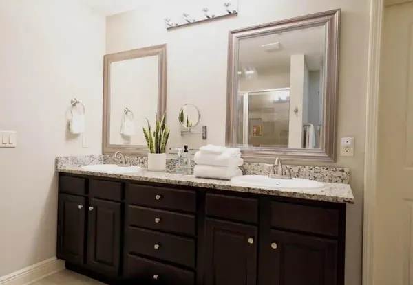 a bathroom with a bathtub and shower