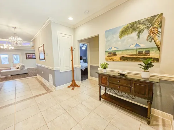 a spacious bathroom with a tub sink and mirror