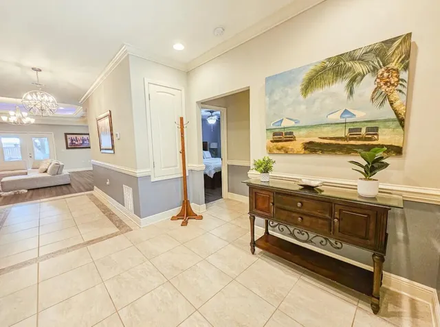 a spacious bathroom with a tub sink and mirror