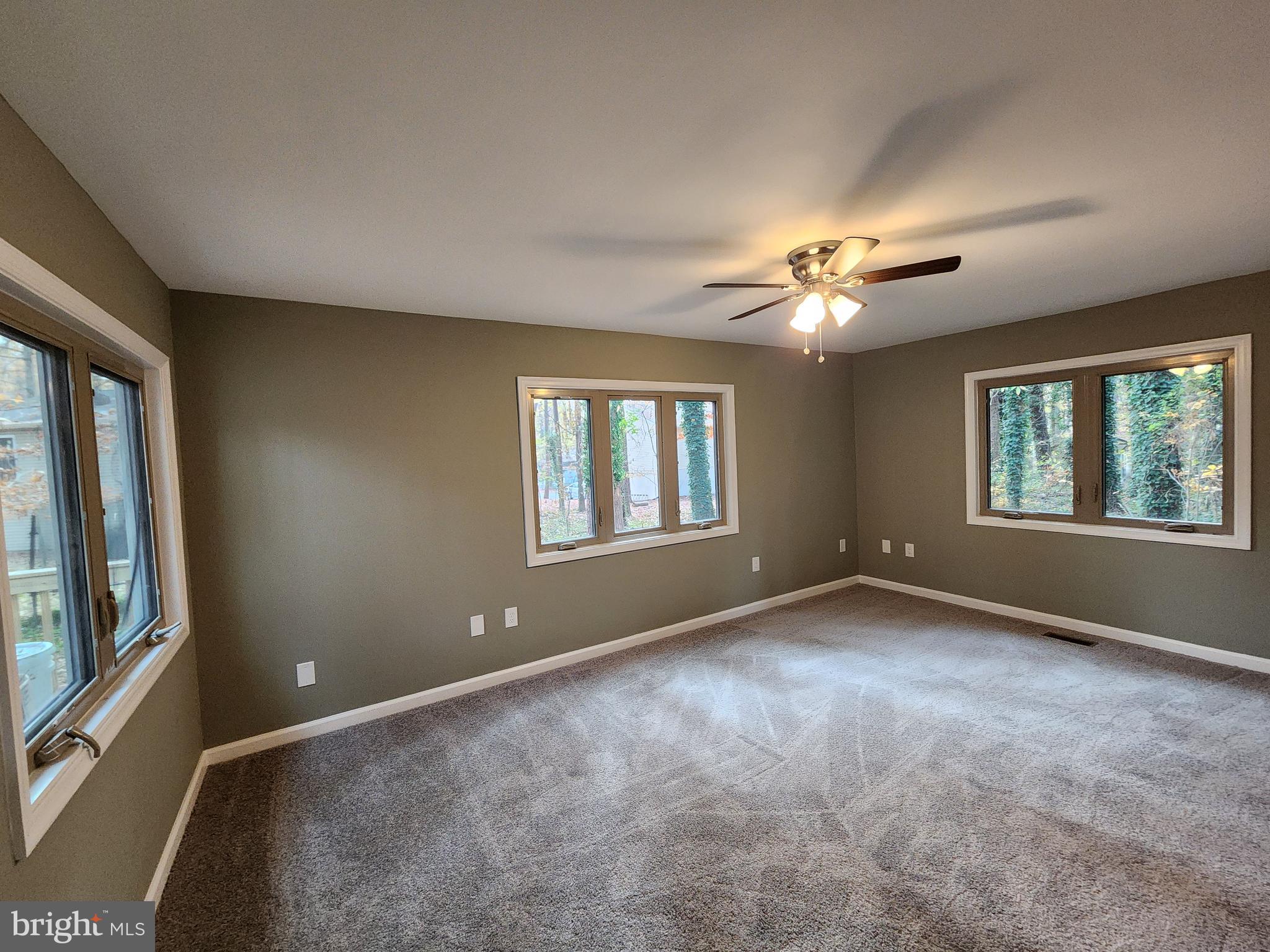 11577 Tomahawk Trail Lusby, MD 20657 - Photo 16 of 28 a view of an empty room with a window