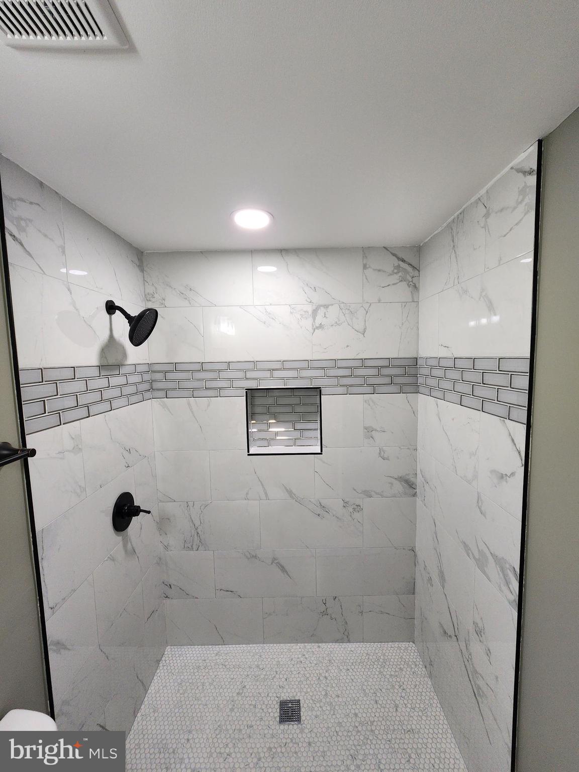 11577 Tomahawk Trail Lusby, MD 20657 - Photo 18 of 28 a bathroom with a shower