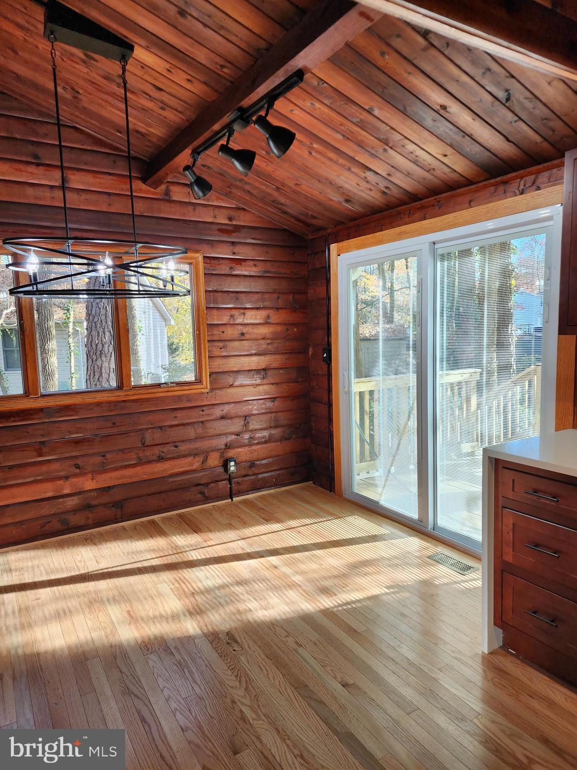 11577 Tomahawk Trail Lusby, MD 20657 - Photo 3 of 28 a view of a room with wooden walls