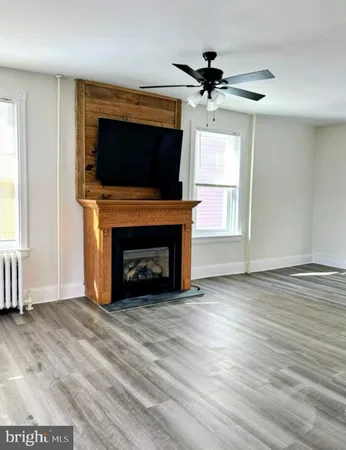 a stove top oven sitting inside of a kitchen