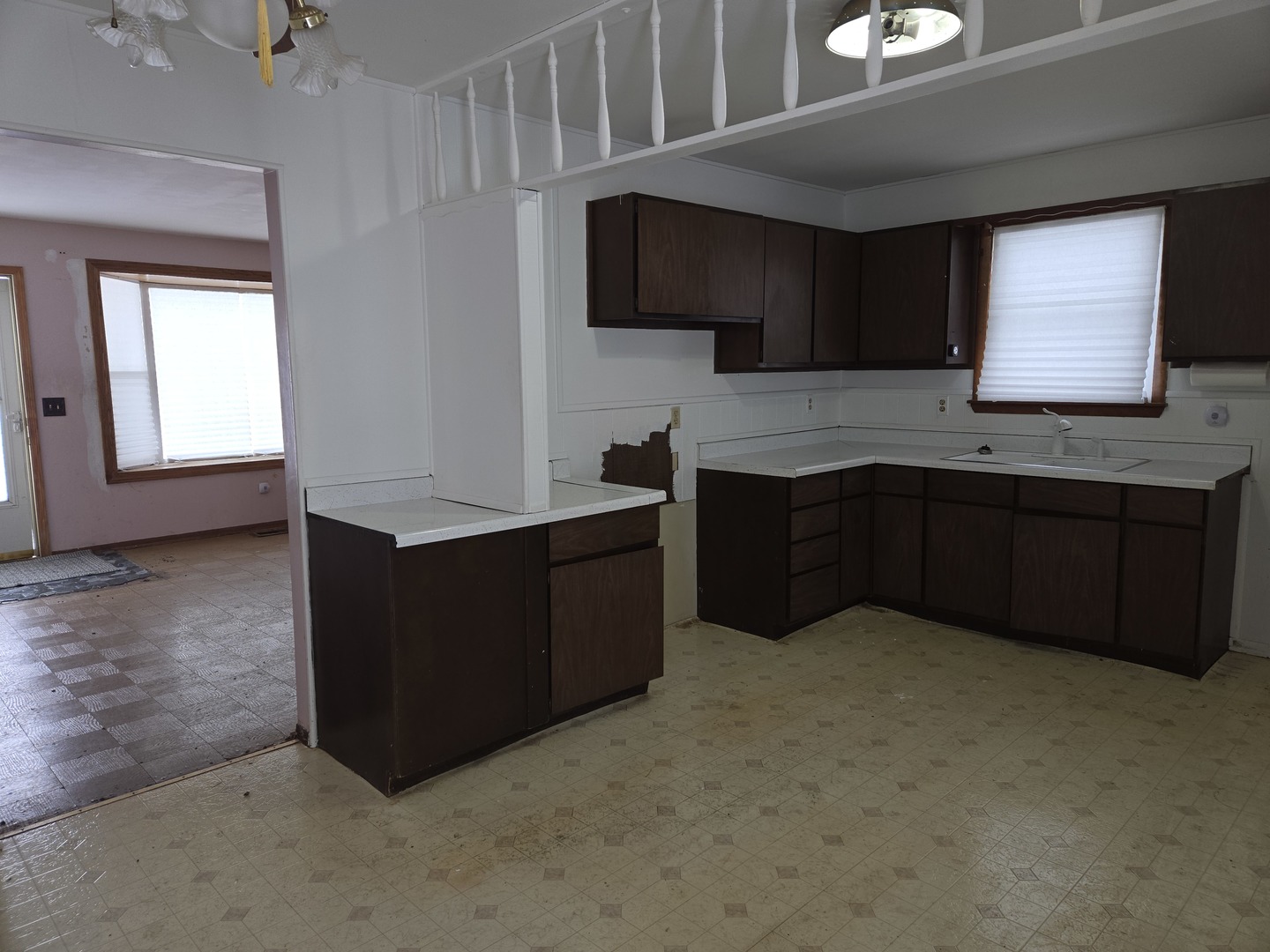 286 South Barbara Drive Kankakee, IL 60901 - Photo 5 of 15 a kitchen with stainless steel appliances granite countertop a stove a sink and a microwave