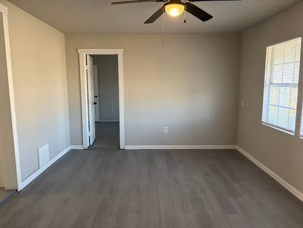 an empty room that has a window