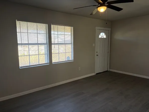 an empty room with window