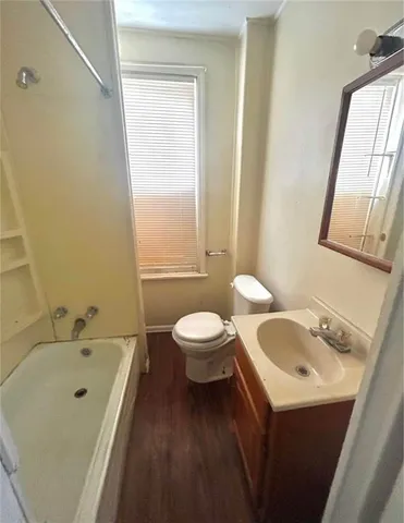 a bathroom with a sink and a toilet