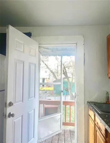 a view of a hallway view with staircase